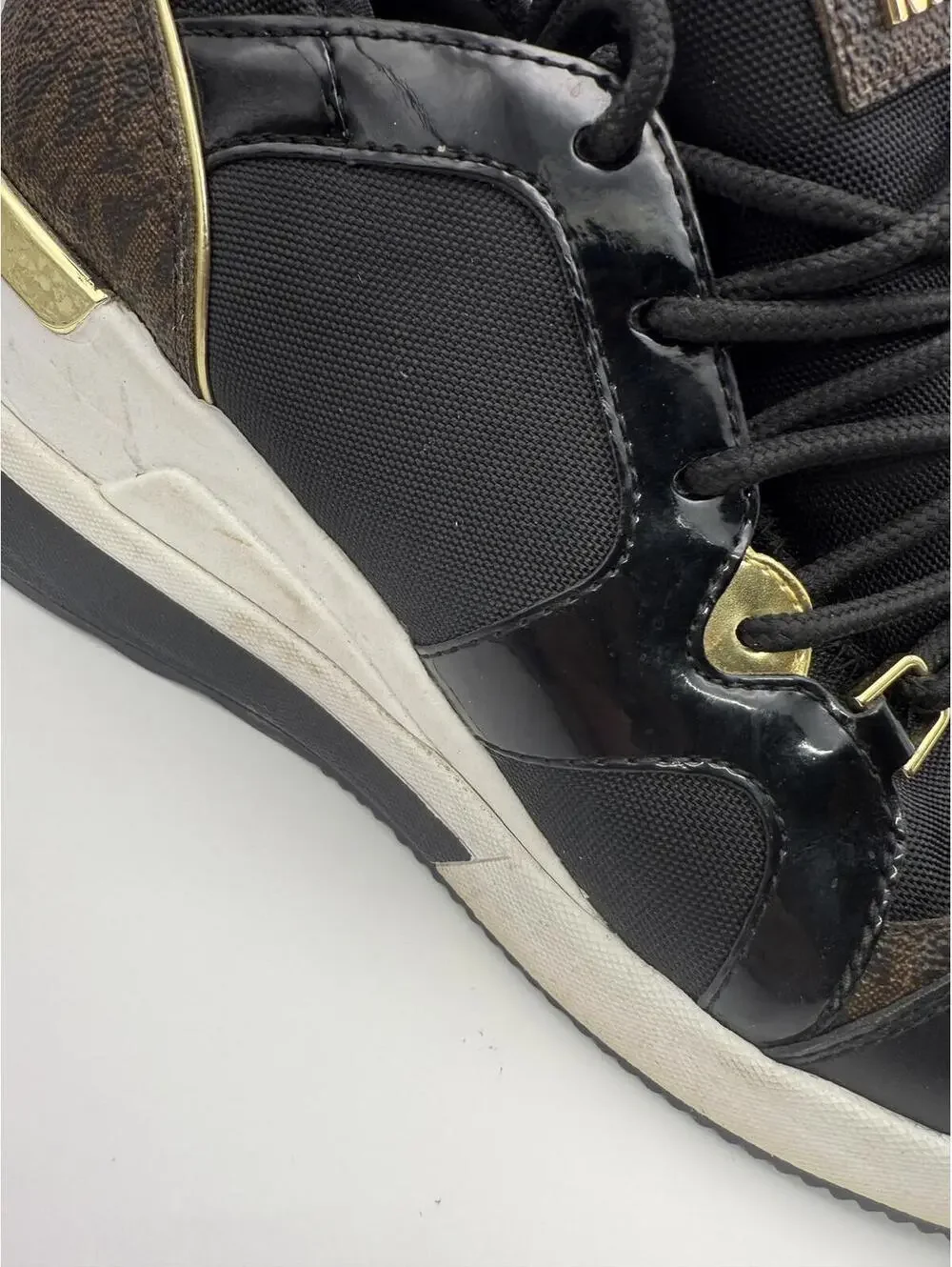 Michael Kors Women's Black and Gold Wedge Sneakers 8.5